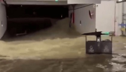 业主否认“私挖地下室挖通河道”，当地称系河水上涨倒灌进车库，暂无伤亡报告