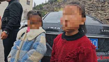 父母在外地打工，8岁姐姐带着6岁妹妹欲骑行80公里找父母，幸被交警送回