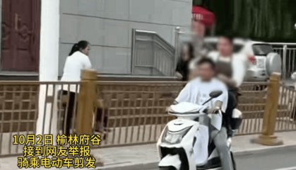 陕西一男子骑电动车时不停理发，被罚款500元、驾驶证记9分；民警呼吁公众注意电动车出行安全